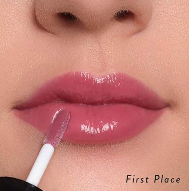 Laura Geller Treat-n-Go Tinted Lip Oil First place